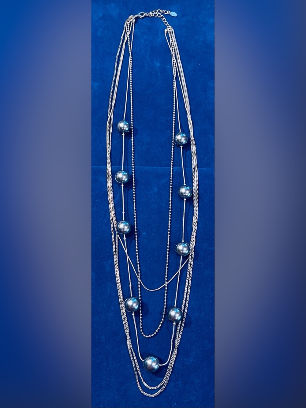 ALI KHAN SILVER PEARLS INTERSPERSED WITH 5 LAYERED LENGTH LINK CHAINS 18”